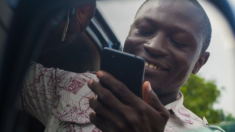 A man holding his phone